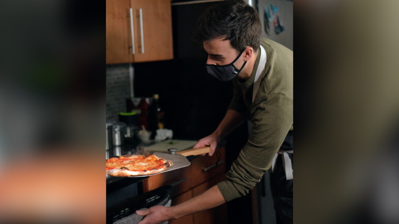 Giving Out Pizza From Second Story Apartment Raises Over $30,000